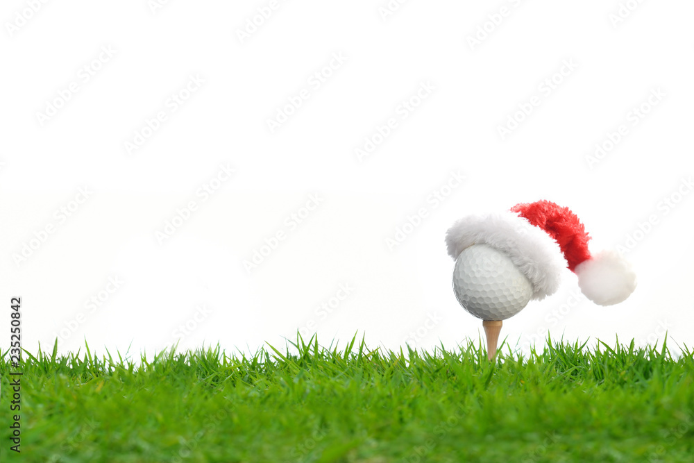 在白色b上隔离的节日季节，球座上戴着圣诞老人帽，看起来很喜庆