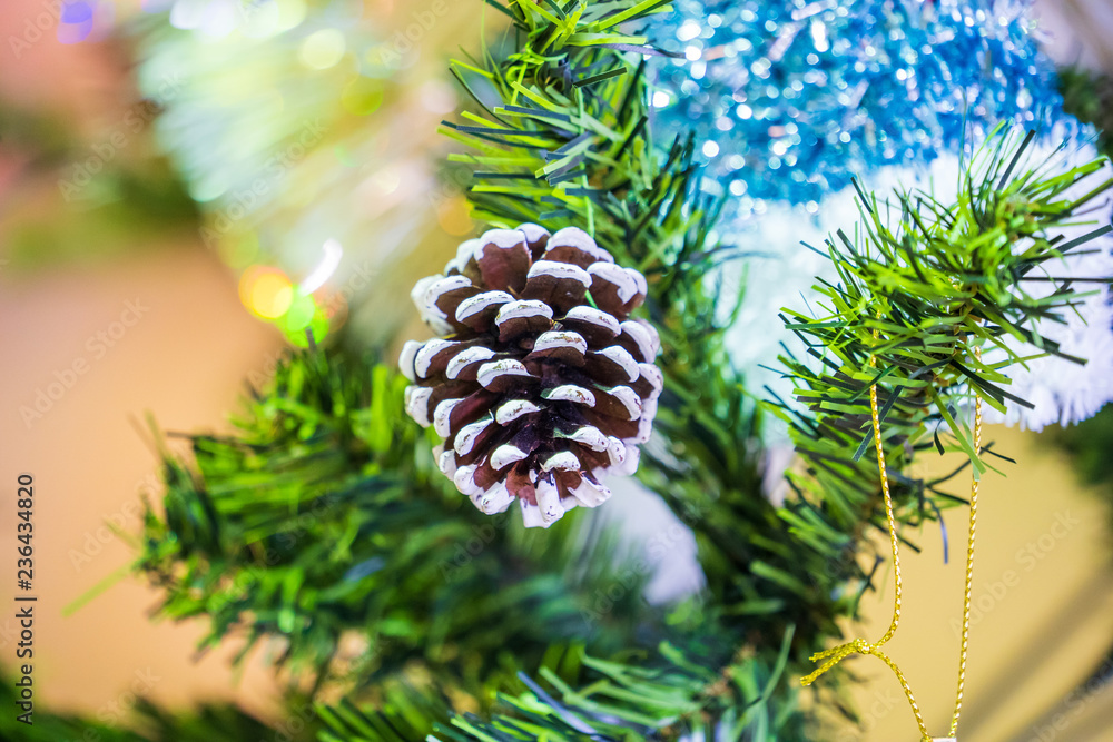 Christmas tree with beautiful xmas decoration in blurry background, bokeh, close up, copy space(text