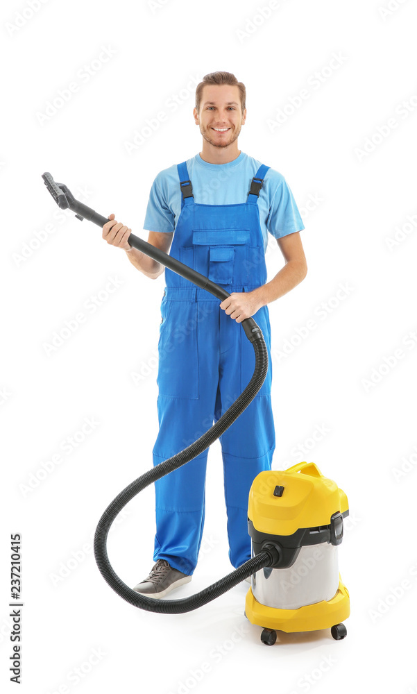 Man with vacuum cleaner on white background