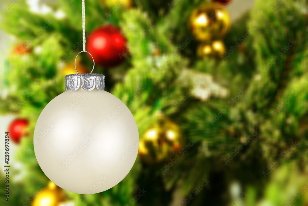 White Christmas Ball on blurred background