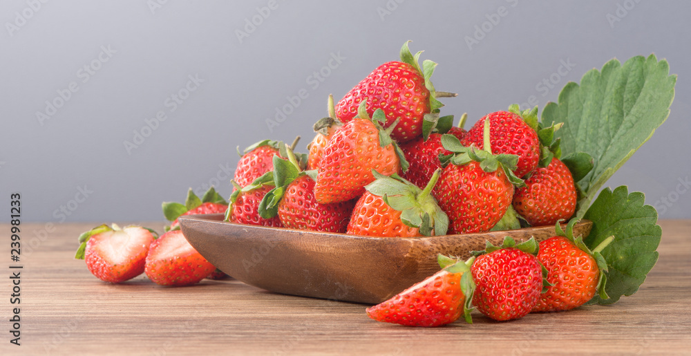 A beautiful and delicious strawberries set isolated on colorful background, close up, macro, copy sp