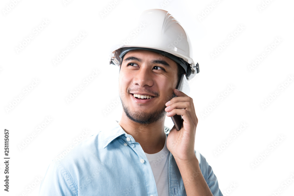Portrait of asian engineer smiling and using a cellphone isolated on white background