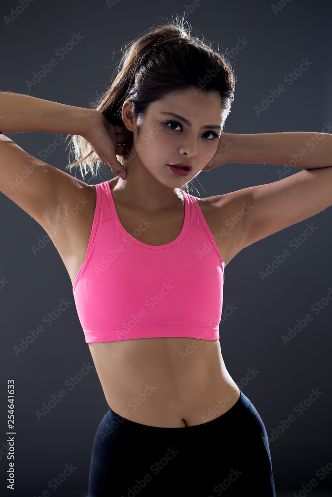 young woman stretching exercising