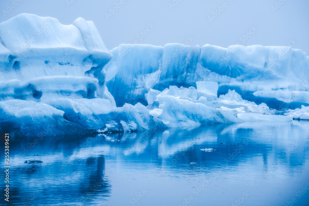 Icebergs in Jokulsarlon beautiful glacial lagoon in Iceland. Jokulsarlon is a famous travel destinat