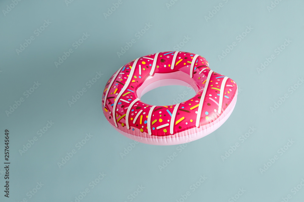 Inflatable ring on color background