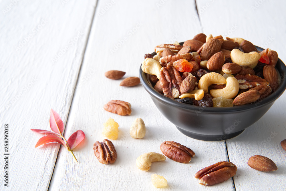 Mix nuts and dried fruits background and wallpaper. Seen from side view of mix nuts and dried fruits
