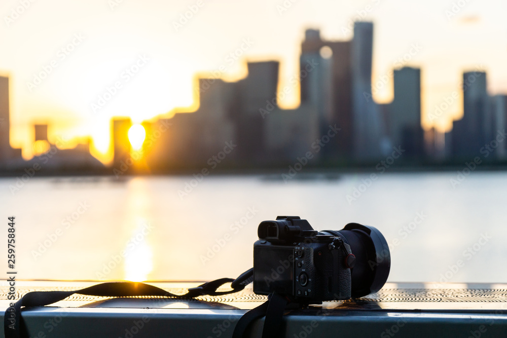 camera with city skyline