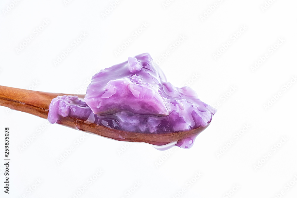 a spoonful of purple yam porridge close-up