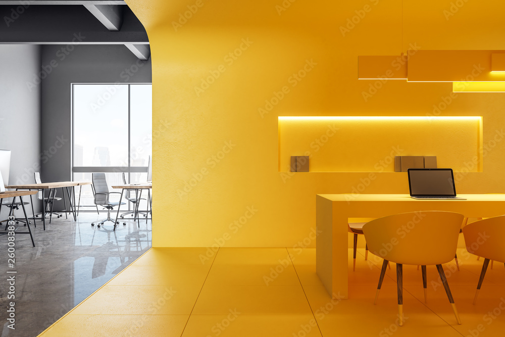 Clean yellow office kitchen