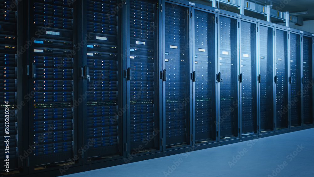 Shot of Modern Data Center With Multiple Rows of Fully Operational Server Racks. Modern High-Tech Te