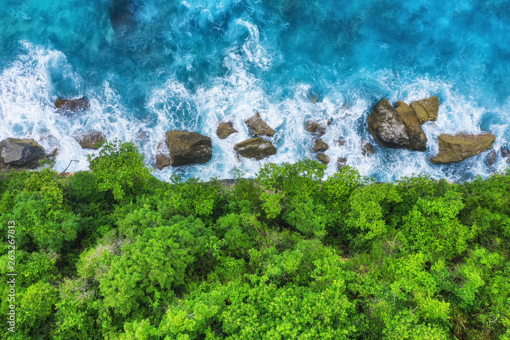Coast as a background from top view. Turquoise water background from top view. Summer seascape from 