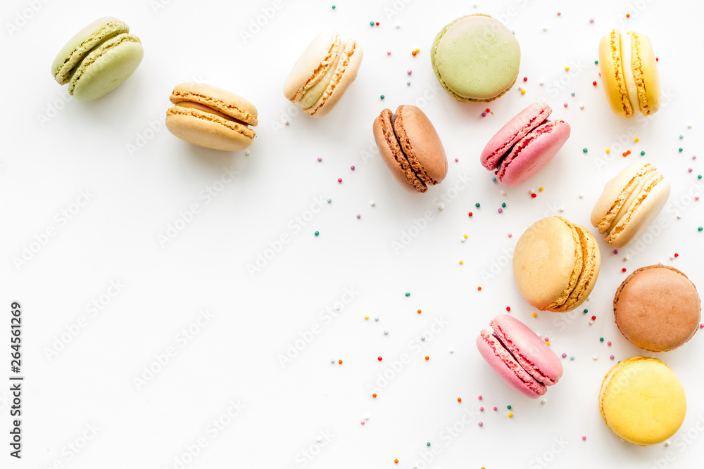Macarons dessert pattern on white background top view copy space