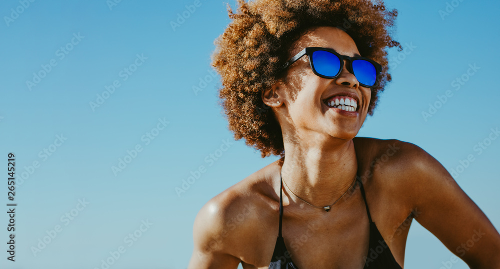 Cheerful woman on summer vacation