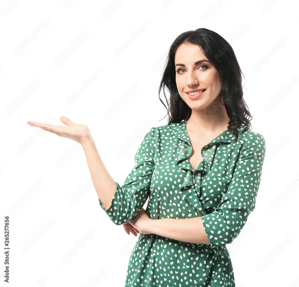 Portrait of beautiful woman holding something on white background
