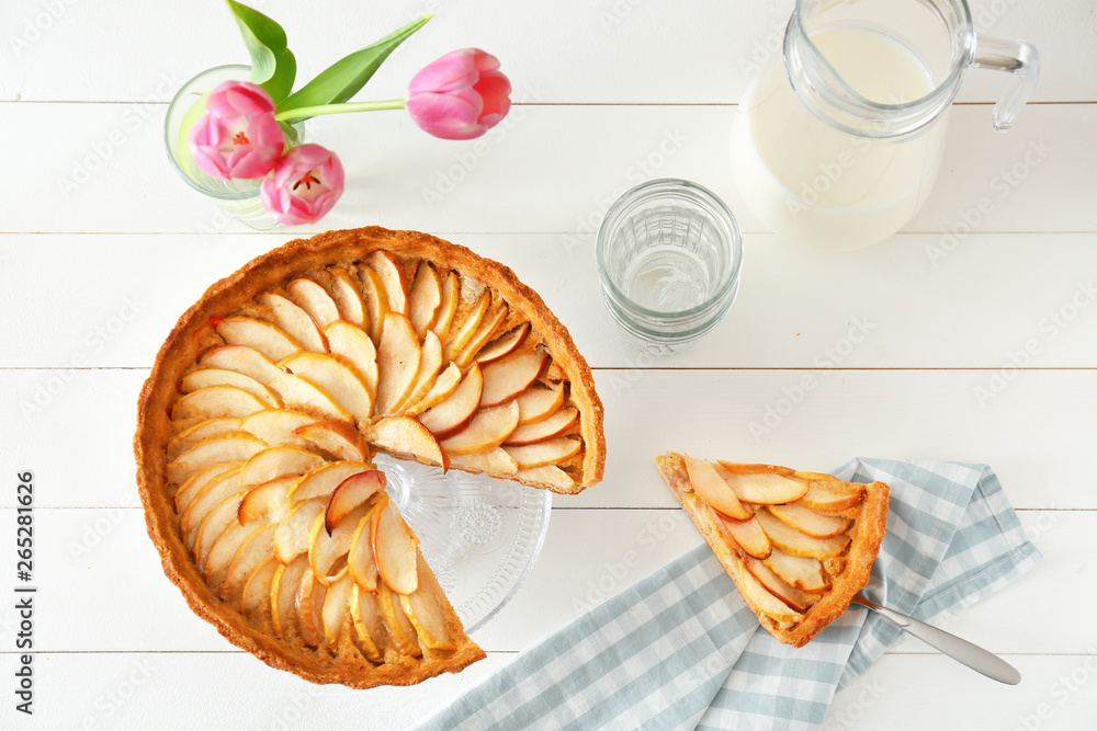 Composition with tasty apple pie on table