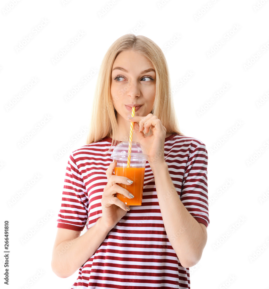 Beautiful young woman with fresh juice on white background