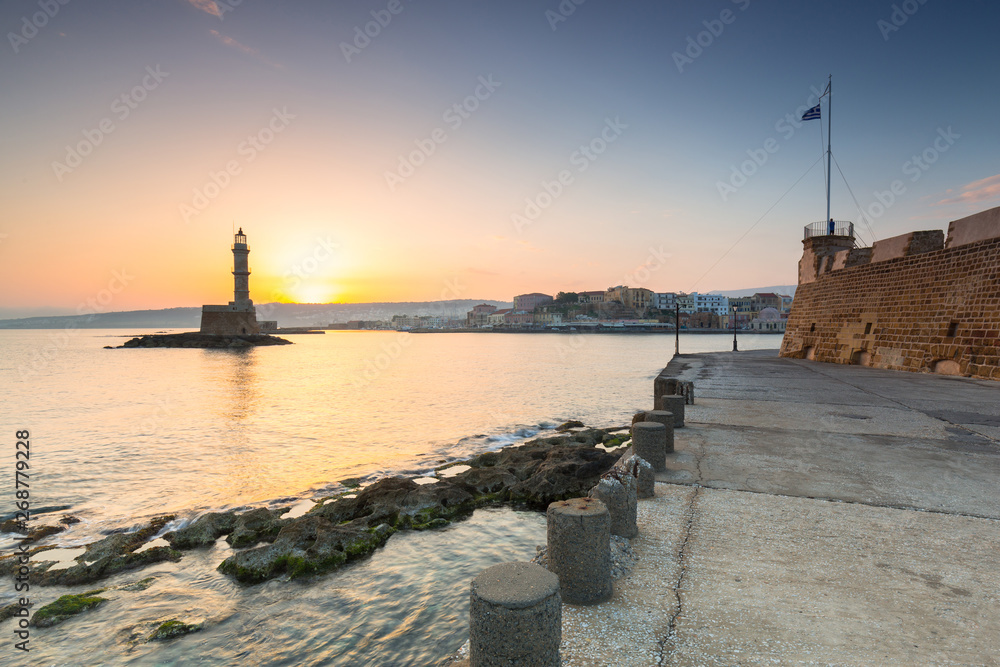 Lighthouse in the port of Chania at sunrise on Crete, Greece