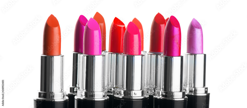 Lipstick tints palette. Fashion colorful lipsticks over white background. Professional makeup and be