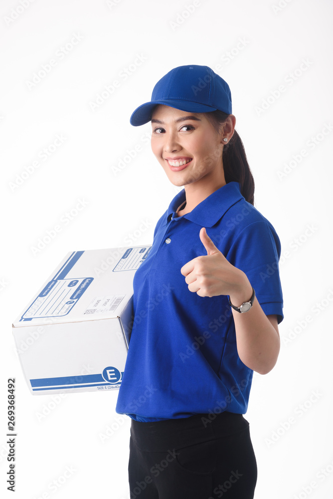 Beautiful young woman in blue uniform of delivery service, online shopping delivery concept