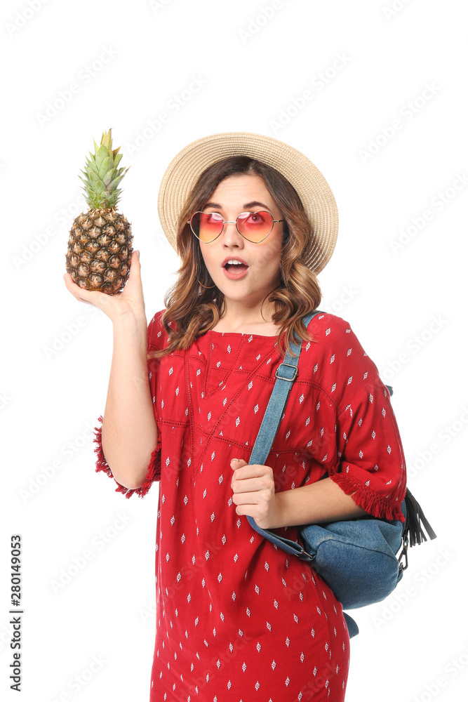 Female tourist with pineapple on white background