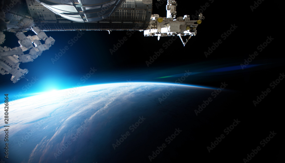 View of planet Earth from a space station window during a sunrise 3D rendering elements of this imag