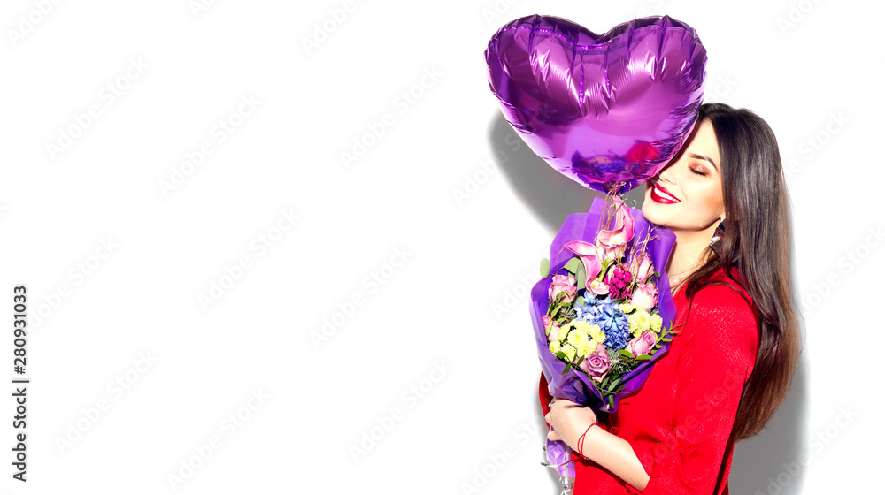Valentines Day. Beauty girl with colorful bouquet of flowers and heart shape air balloon on white b