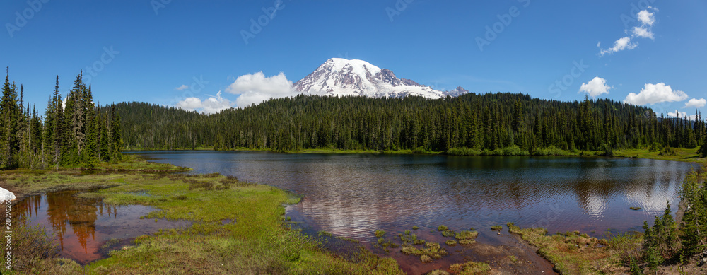 Beautiful Panoramic View of Reflection Lake with Mt Rainier in the background during a sunny summer 