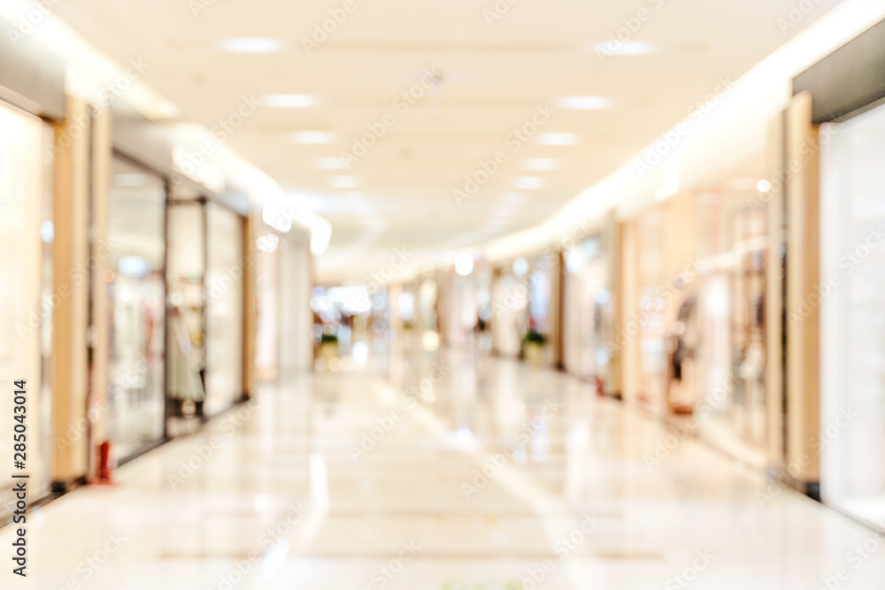 Luxury department store shopping mall interior, abstract defocused blur with bokeh background, conce