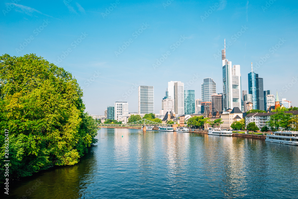 Frankfurt am Main financial district modern buildings and Main river in Germany
