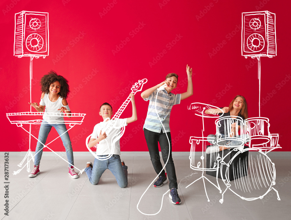 Teenage musicians with drawing instruments playing against color wall