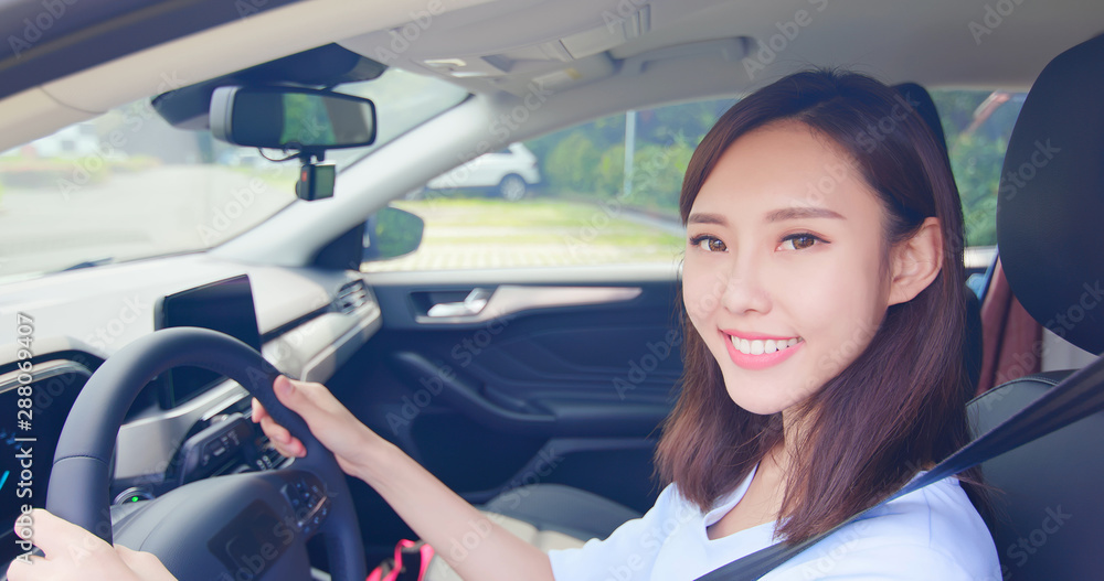 Asian woman in the car