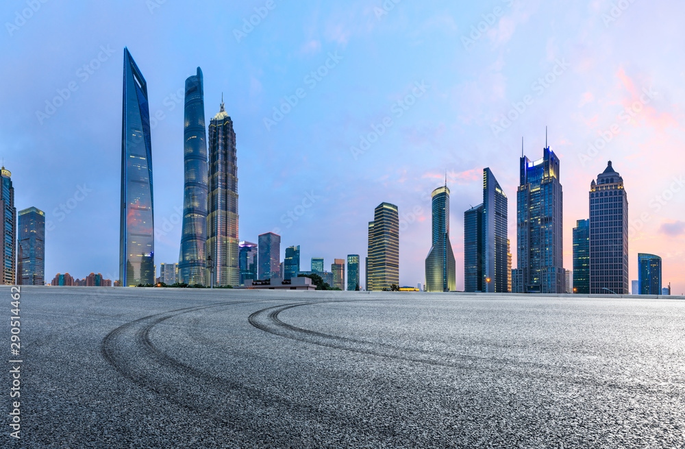 Race track ground and modern commercial buildings in Shanghai at sunset,China.