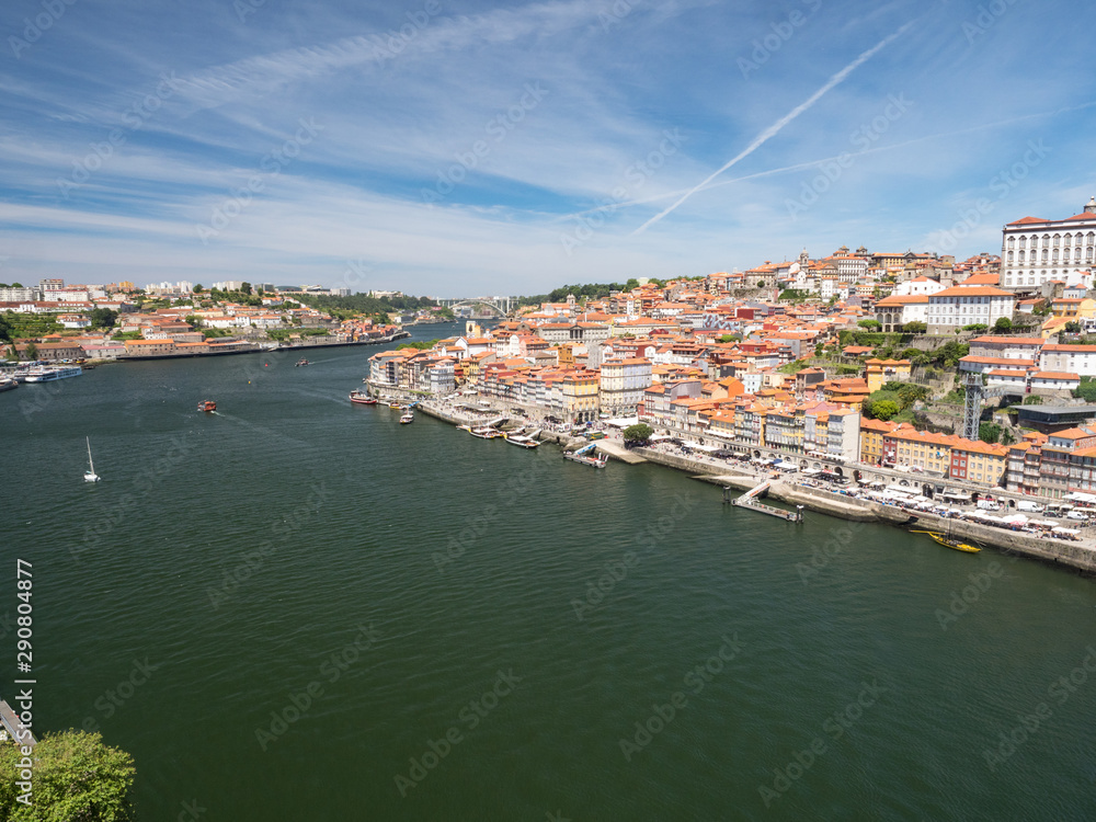 Portugal, may 2019: Panorama from famous bridge Ponte dom Luis above Old town Porto and river Duoro 