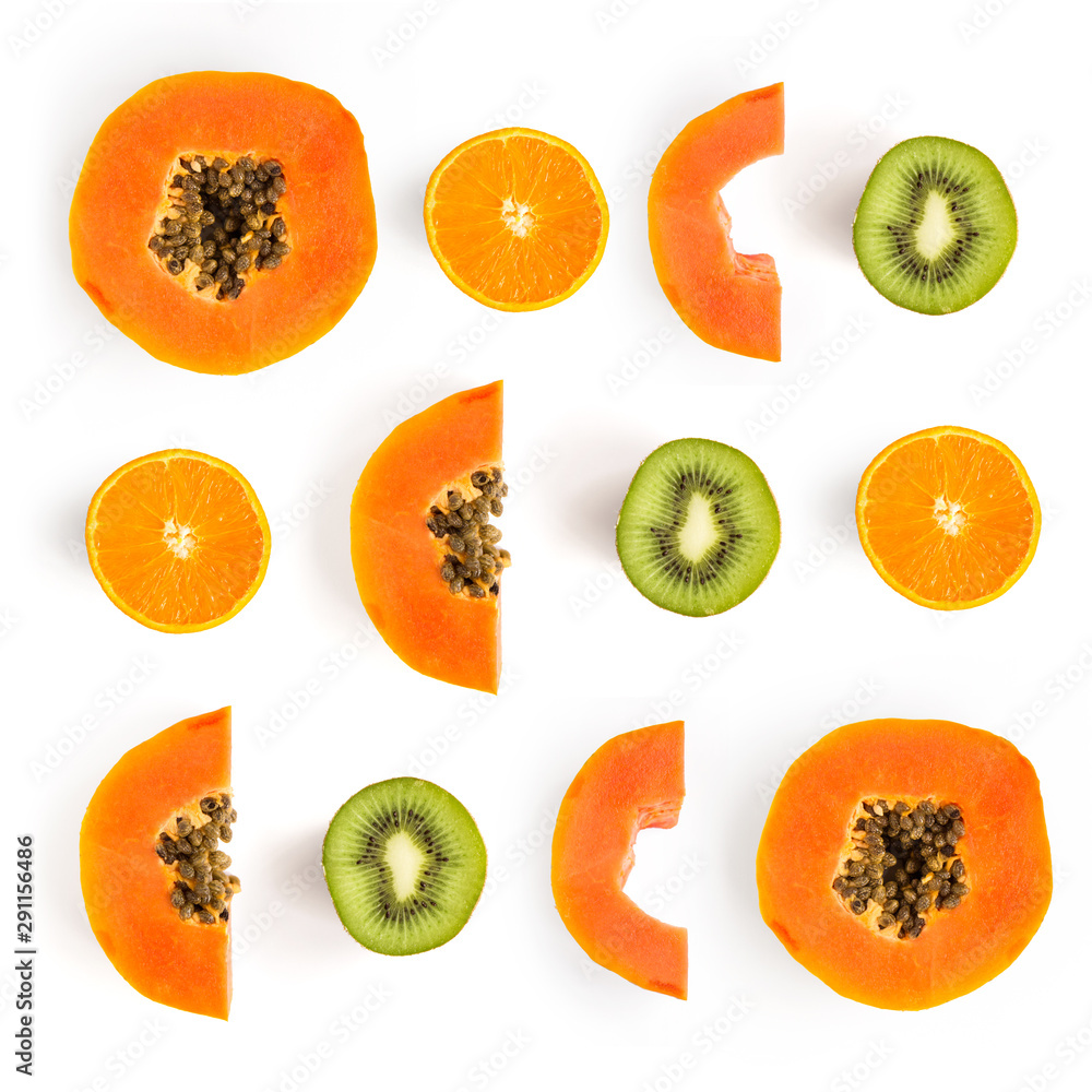 木瓜、猕猴桃和橙色图案。热带抽象背景。木瓜、猕猴桃、白色橙色