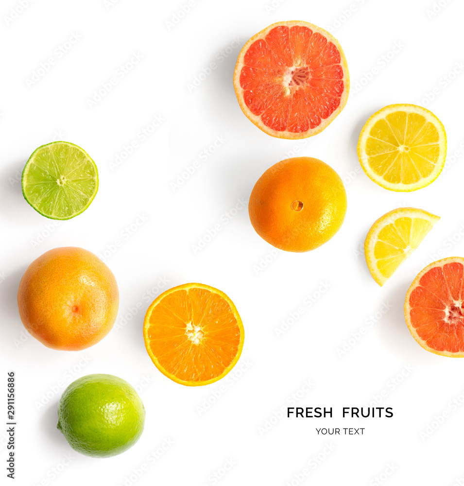 由柠檬、酸橙、橙子和葡萄柚制成的创意布局。平躺。食物概念。柠檬、酸辣、ora