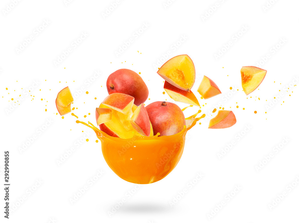 Whole and sliced mango with splashes of fresh juice, isolated on white background