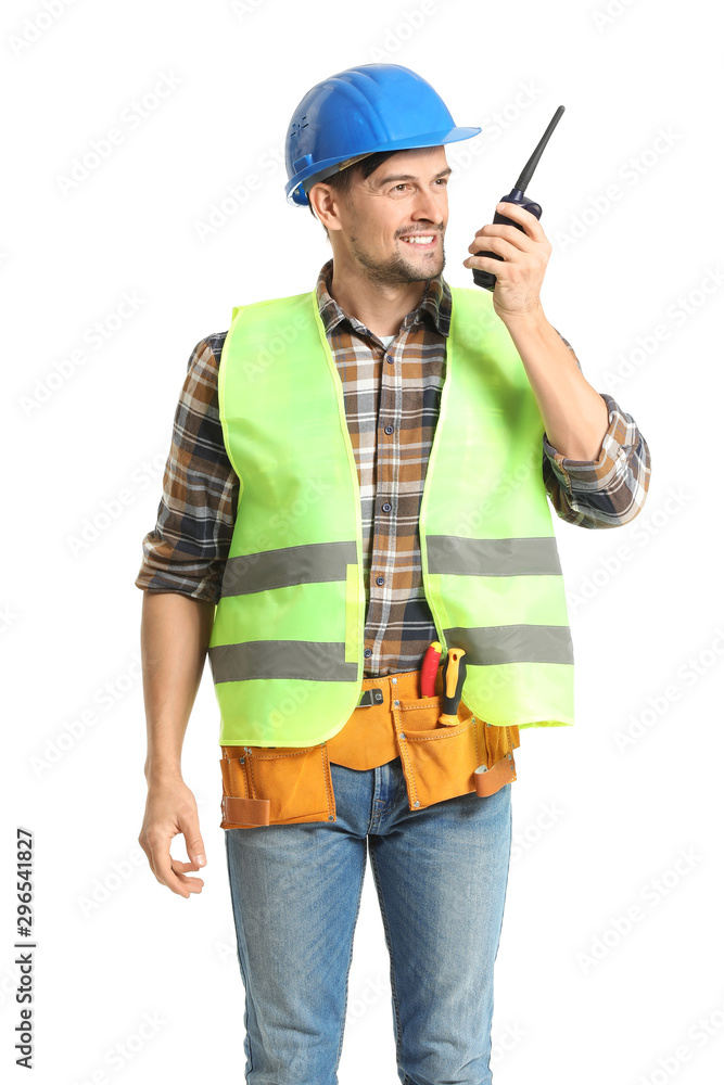 Portrait of male architect with portable radio transmitter on white background
