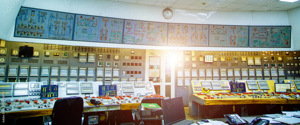 Industrial control panel at the energy plant. Energy and power generation. Selective focus closeup. 