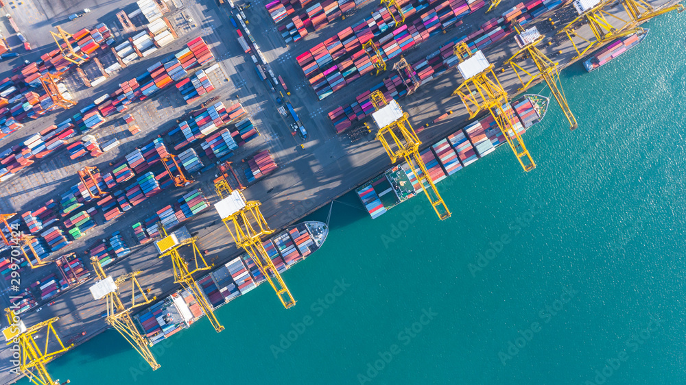 Container ship  loading in a port, Aerial top view container ship in business import export transpor