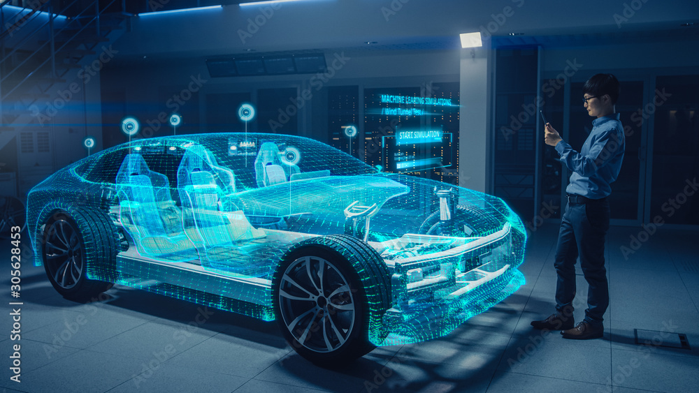 汽车工程师使用数字平板电脑和增强现实3D软件进行3D汽车模式