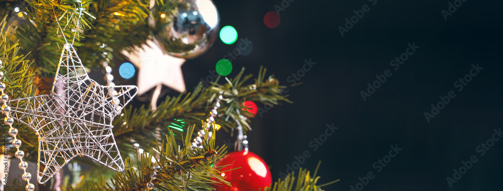 Beautiful Christmas decor concept, bauble hanging on the Christmas tree with sparkling light spot, b