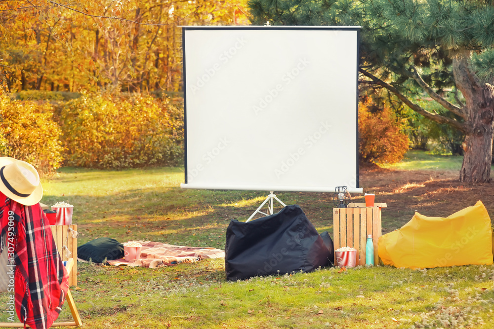 Outdoor cinema in autumn park