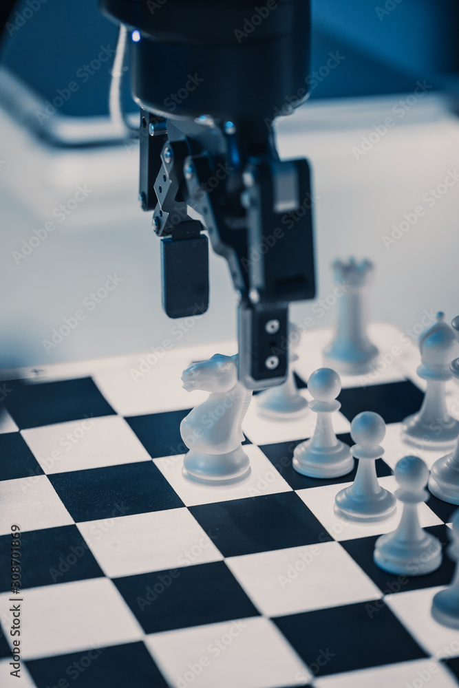 Close Up Vertical Shot of Artificial Intelligence Operating a Futuristic Robotic Arm in a Game of Ch