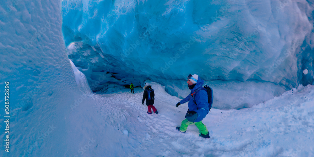 SELFIE: Active tourists explore the stunning ice caverns in British Columbia.