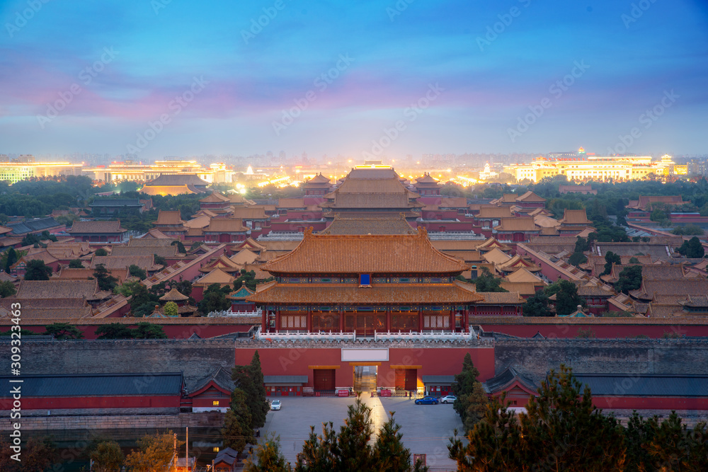 Aerial bird view of the architecture building and decoration of the Forbidden City at night in Beiji