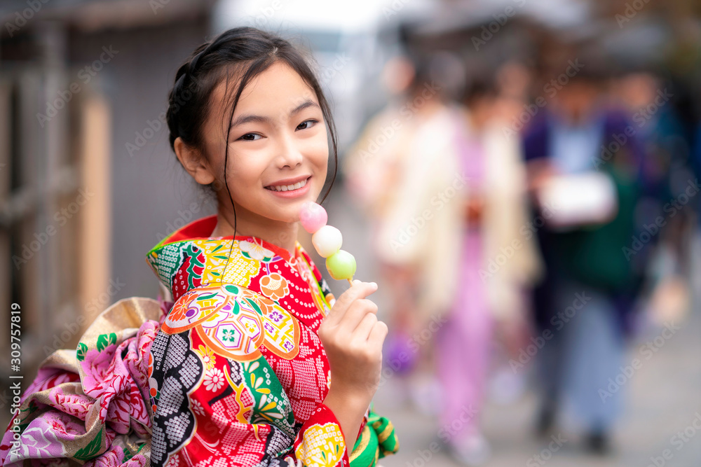 Japanese girl in traditional kimono dress