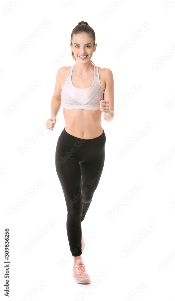 白人背景下的运动型跑步年轻女性