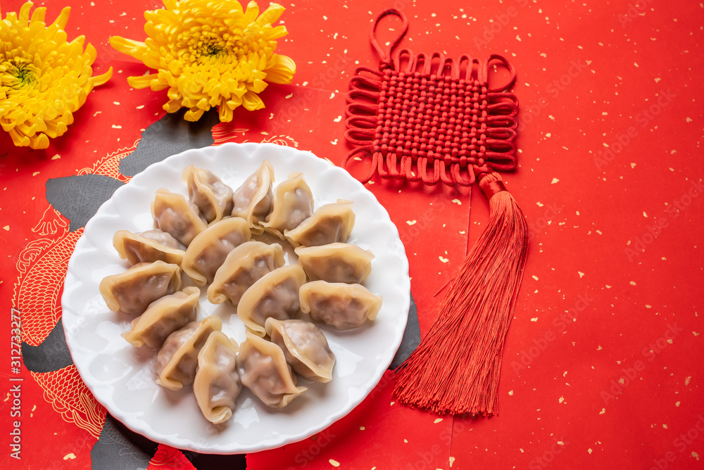 中国春节美食饺子和红包一厢情愿的结背景材料