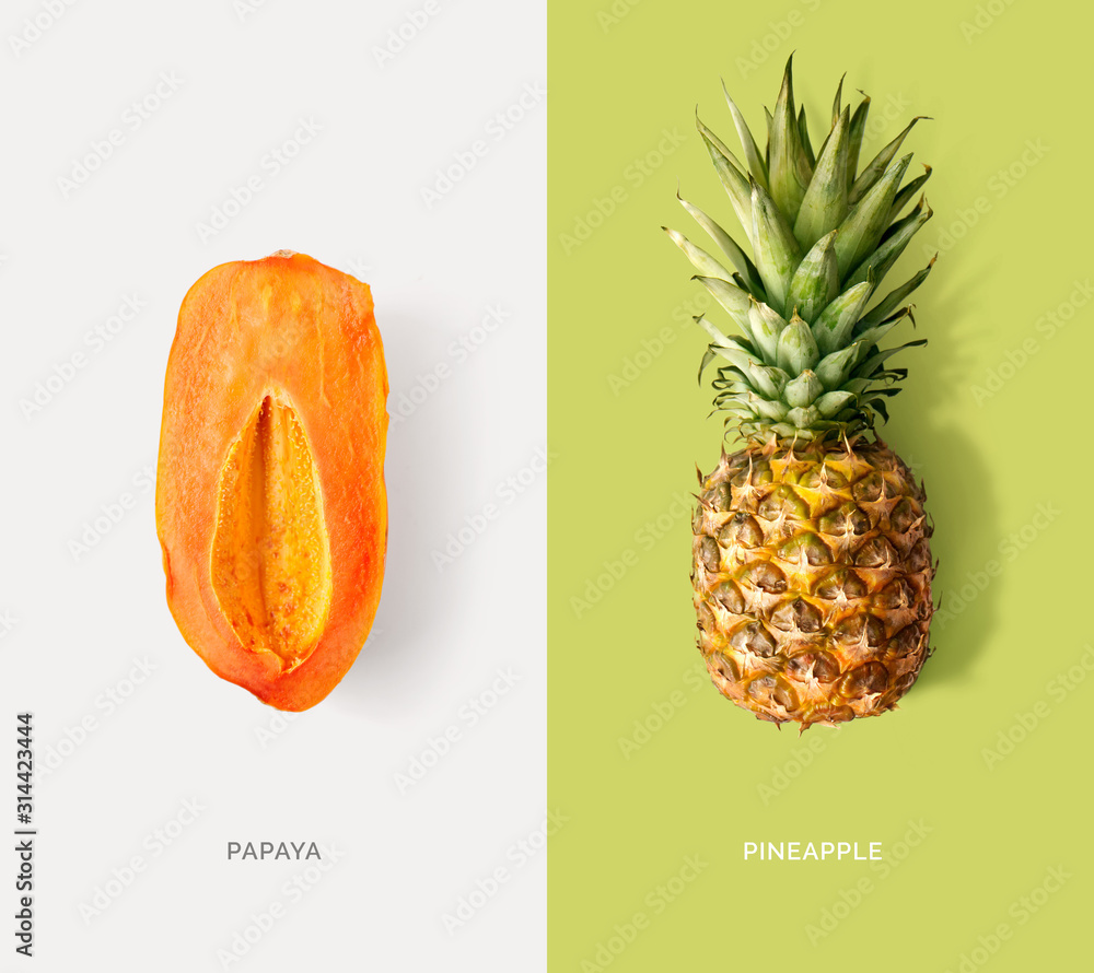 由木瓜和菠萝制成的创意布局。平躺。食物概念。