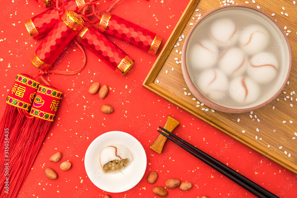 中国元宵节传统美食红底花生饺子